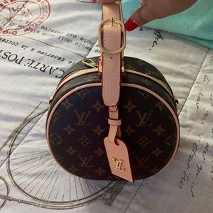 Louis Vuitton circle purse